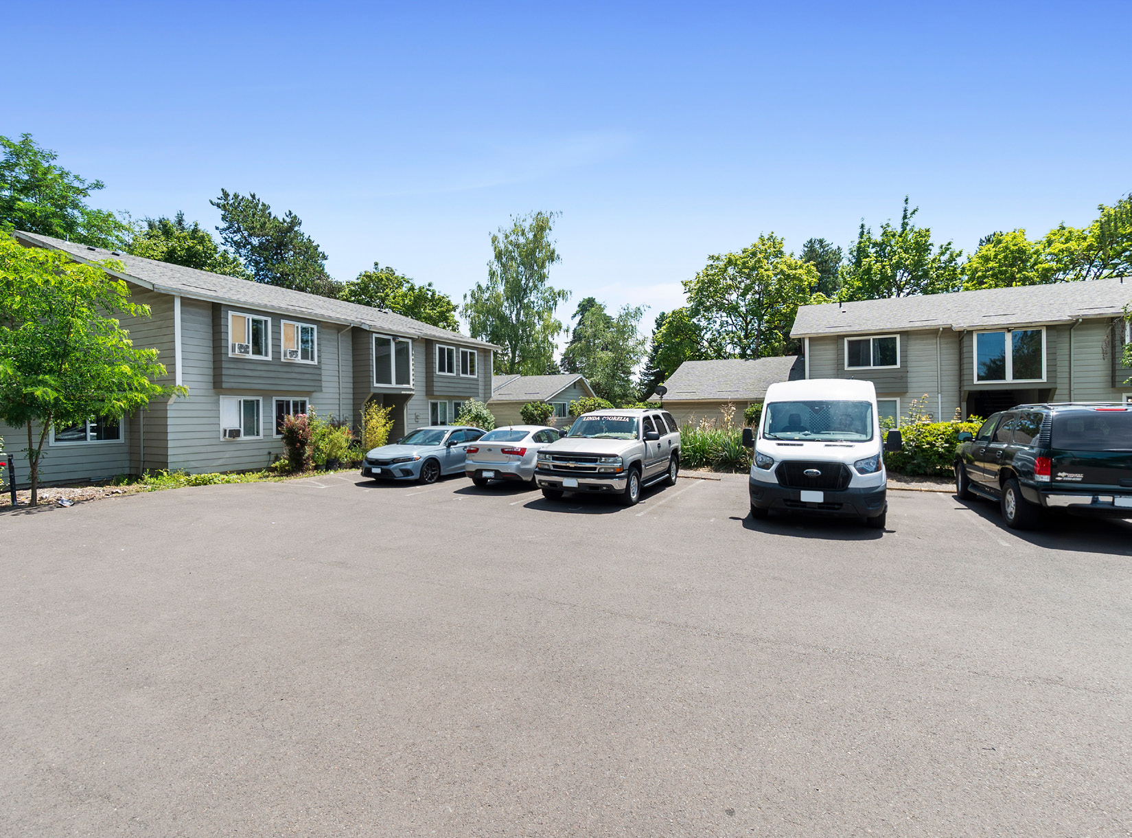 Paved walkway between apartment buildings